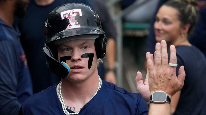 Toledo Mud Hens center fielder Max Clark (3) is congratulate after he scores a run during a game against the Indianapolis Indians celebrating the Indians’ 30th anniversary Saturday, July 11, 2026, at Victory Field in Indianapolis.