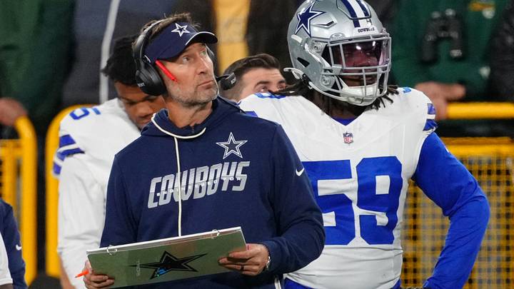 Dallas Cowboys head coach Brian Schottenheimer looks on during the first half against the Green Bay Packers at Lambeau Field. Dallas Cowboys head coach Brian Schottenheimer looks on during the first half against the Green Bay Packers at Lambeau Field.