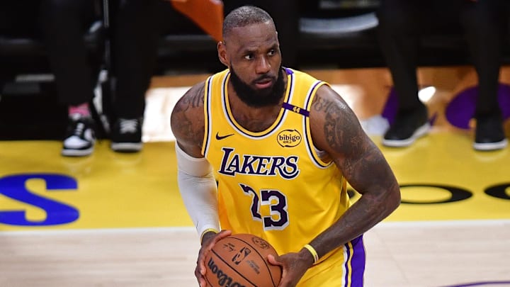 Apr 30, 2025; Los Angeles, California, USA; Los Angeles Lakers forward LeBron James (23) controls the ball against the Minnesota Timberwolves during the second half in game five of first round for the 2025 NBA Playoffs at Crypto.com Arena. Mandatory Credit: Gary A. Vasquez-Imagn Images