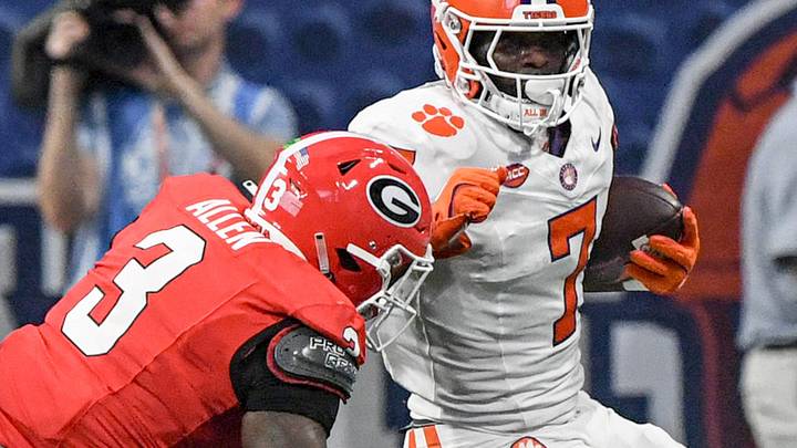 Aug 31, 2024; Atlanta, Georgia, USA; Clemson Tigers running back Phil Mafah (7) runs against Georgia Bulldogs linebacker CJ Allen (3) during the first quarter of the 2024 Aflac Kickoff Game at Mercedes-Benz Stadium. Mandatory Credit: Ken Ruinard-Imagn Images