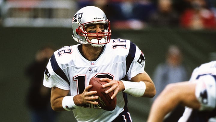 Dec 2, 2001; East Rutherford, NJ, USA; FILE PHOTO; New England Patriots quarterback Tom Brady (12) in action against the New York Jets at Giants Stadium. Mandatory Credit: Lou Capozzola-USA TODAY NETWORK
