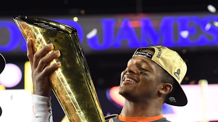 Clemson quarterback Deshaun Watson (4) holds the National Championship trophy after the Tigers defeated Alabama 35-31 at Raymond James Stadium in Tampa on Monday, January 9, 2017.

Football 2017 Clemson Alabama