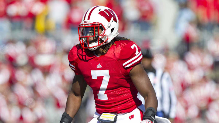 Former Wisconsin Badgers safety Aaron Henry (7) is leaving Bret Bielema's staff at Illinois to coach for Notre Dame.