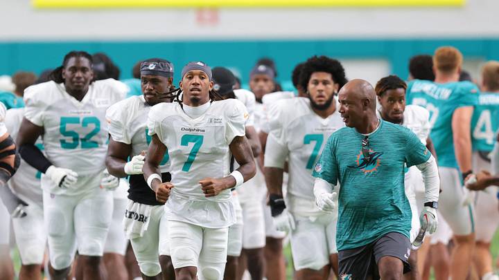 Miami Dolphins wide receiver Caleb Douglas (7) runs on the field during practice at the Baptist Health Training Complex. Miami Dolphins wide receiver Caleb Douglas (7) runs on the field during practice at the Baptist Health Training Complex.