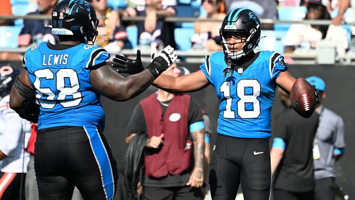 Carolina Panthers wide receiver Jalen Coker (18) clebrates with guard Damien Lewis (68) after scoring a touchdown in the second half at Bank of America Stadium. Mandatory Credit: Bob Donnan-Imagn Images