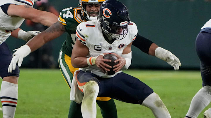 Green Bay Packers defensive end Karl Brooks (94) sacks Chicago Bears quarterback Justin Fields (1) during the fourth quarter of their game Sunday, January 7, 2024 at Lambeau Field in Green Bay, Wisconsin. The Green Bay Packers beat the Chicago Bears 17-9.
