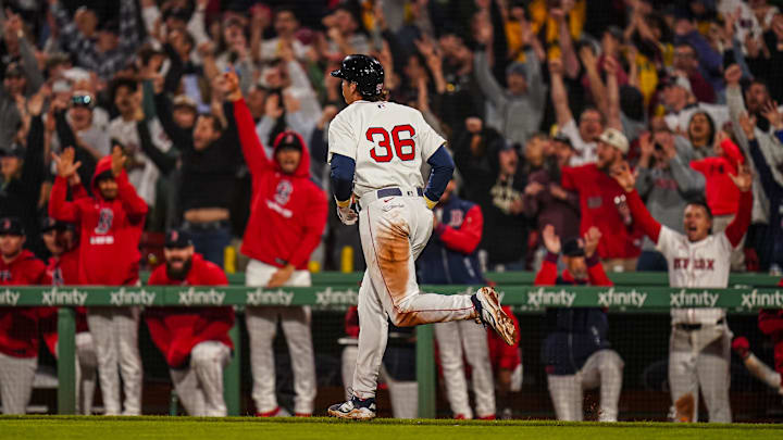 Apr 22, 2025; Boston, Massachusetts, USA; Boston Red Sox first base Triston Casas (36) hits a three run home run against the Seattle Mariners in the seventh inning at Fenway Park. Mandatory Credit: David Butler II-Imagn Images