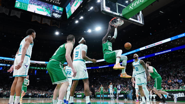 Apr 12, 2024; Boston, Massachusetts, USA; Boston Celtics center Neemias Queta (88) makes the basket vs. the Charlotte Hornets.