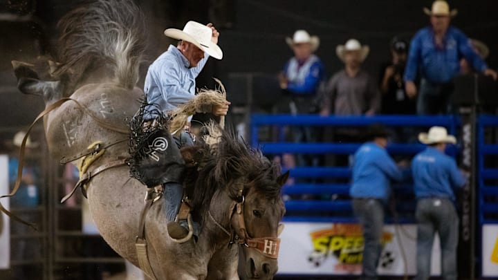 Cowboys compete in saddle bronc riding at the Starr Western Wears Rodeo’s opening night at the El Paso County Coliseum on Friday, June 21, 2024.