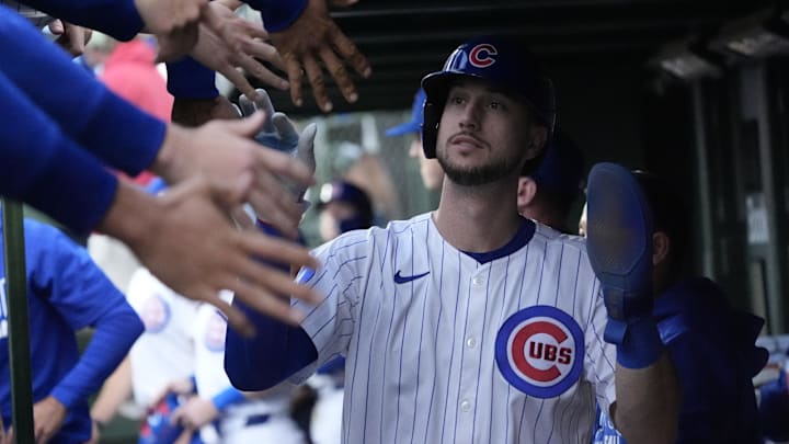 Oct 2, 2025; Chicago, Illinois, USA; Chicago Cubs outfielder Kyle Tucker (30) is greeted in the dugout after scoring against the San Diego Padres during game three of the Wildcard round for the 2025 MLB playoffs at Wrigley Field. Mandatory Credit: David Banks-Imagn Images Oct 2, 2025; Chicago, Illinois, USA; Chicago Cubs outfielder Kyle Tucker (30) is greeted in the dugout after scoring against the San Diego Padres during game three of the Wildcard round for the 2025 MLB playoffs at Wrigley Field. Mandatory Credit: David Banks-Imagn Images