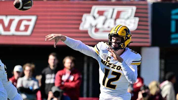 Oct 12, 2024; Amherst, Massachusetts, USA; Missouri Tigers quarterback Brady Cook (12) throws a pass against the Massachusetts Minutemen during the first half at Warren McGuirk Alumni Stadium. Mandatory Credit: Eric Canha-Imagn Images Oct 12, 2024; Amherst, Massachusetts, USA; Missouri Tigers quarterback Brady Cook (12) throws a pass against the Massachusetts Minutemen during the first half at Warren McGuirk Alumni Stadium. Mandatory Credit: Eric Canha-Imagn Images