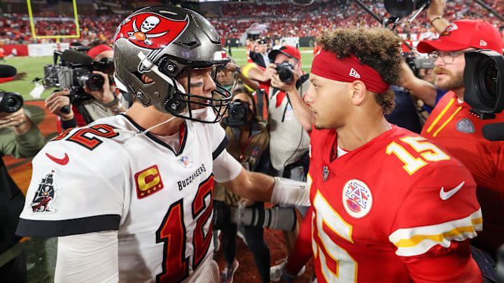 Oct 2, 2022; Tampa, Florida, USA;  Tampa Bay Buccaneers quarterback Tom Brady (12) greets Kansas City Chiefs quarterback Patrick Mahomes (15) after a game at Raymond James Stadium. Mandatory Credit: Nathan Ray Seebeck-Imagn Images