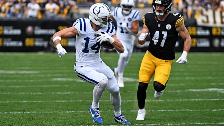 Nov 2, 2025; Pittsburgh, Pennsylvania, USA; Indianapolis Colts wide receiver Alec Pierce (14) catches a pass during the first half as Pittsburgh Steelers linebacker Payton Wilson (41) defends at Acrisure Stadium. Mandatory Credit: Barry Reeger-Imagn Images Nov 2, 2025; Pittsburgh, Pennsylvania, USA; Indianapolis Colts wide receiver Alec Pierce (14) catches a pass during the first half as Pittsburgh Steelers linebacker Payton Wilson (41) defends at Acrisure Stadium. Mandatory Credit: Barry Reeger-Imagn Images