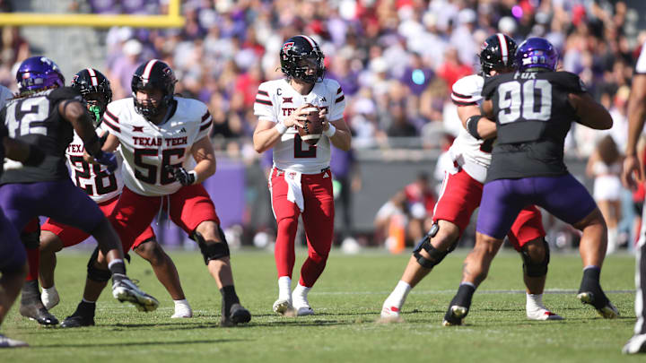 Oct 26, 2024; Fort Worth, Texas, USA; Texas Tech Red Raiders quarterback Behren Morton (2) throws a pass against the TCU Horned Frogs in the first quarter  at Amon G. Carter Stadium. Mandatory Credit: Tim Heitman-Imagn Images