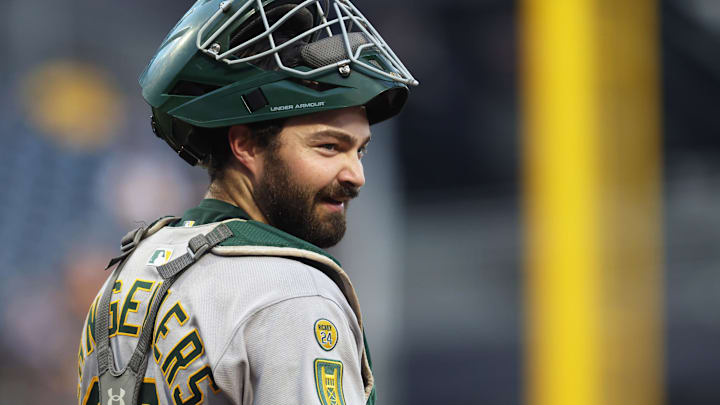 Sep 19, 2025; Pittsburgh, Pennsylvania, USA; Athletics catcher Shea Langeliers (23) looks to the Athletics dugout against the Pittsburgh Pirates during the first inning at PNC Park. Mandatory Credit: Charles LeClaire-Imagn Images Sep 19, 2025; Pittsburgh, Pennsylvania, USA; Athletics catcher Shea Langeliers (23) looks to the Athletics dugout against the Pittsburgh Pirates during the first inning at PNC Park. Mandatory Credit: Charles LeClaire-Imagn Images