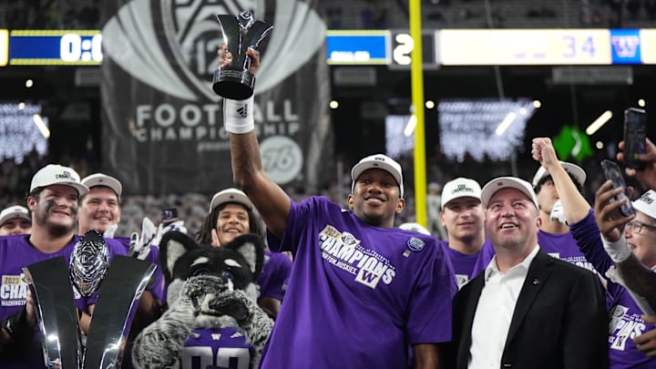 Dec 1, 2023; Las Vegas, NV, USA; Washington Huskies quarterback Michael Penix Jr. (9) holds the the