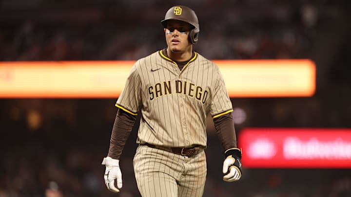 Jun 3, 2025; San Francisco, California, USA; San Diego Padres third baseman Manny Machado (13) returns to the dugout against the San Francisco Giants during the eighth inning at Oracle Park. Mandatory Credit: Kelley L Cox-Imagn Images Jun 3, 2025; San Francisco, California, USA; San Diego Padres third baseman Manny Machado (13) returns to the dugout against the San Francisco Giants during the eighth inning at Oracle Park. Mandatory Credit: Kelley L Cox-Imagn Images