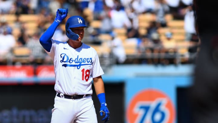 Jul 24, 2022; Los Angeles, California, USA; Los Angeles Dodgers designated hitter Jake Lamb (18) celebrates after hitting a double and earning a RBI against the San Francisco Giants during the seventh inning at Dodger Stadium. Mandatory Credit: Jonathan Hui-USA TODAY Sports