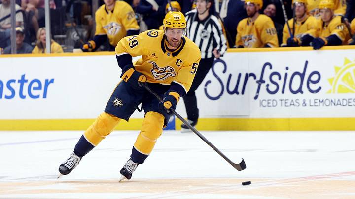 Apr 11, 2026; Nashville, Tennessee, USA; Nashville Predators defenseman Roman Josi (59) moves the puck during the first period of their game against the Minnesota Wild at Bridgestone Arena. Mandatory Credit: Alan Poizner-Imagn Images