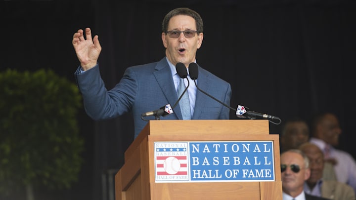 Jul 20, 2019; Cooperstown, NY, USA; Jayson Stark, the J.G. Taylor Spink Award for baseball writing, makes his acceptance speech during the awards ceremony for broadcasters and writers at Doubleday Field.