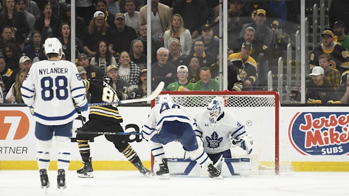 May 4, 2024; Boston, Massachusetts, USA; Boston Bruins right wing David Pastrnak (88) scores the Game 7 overtime winner against the Toronto Maple Leafs.