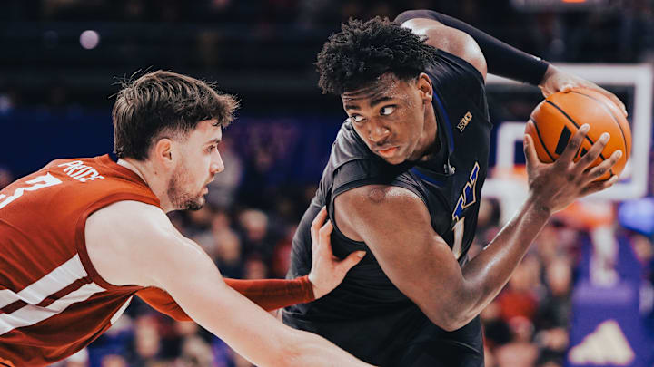 Husky forward Great Osobor looks for an open lane to the basket. 
