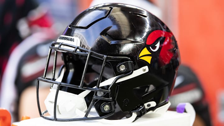 Dec 8, 2024; Glendale, Arizona, USA; Detailed view of an Arizona Cardinals helmet at State Farm Stadium. Mandatory Credit: Mark J. Rebilas-Imagn Images