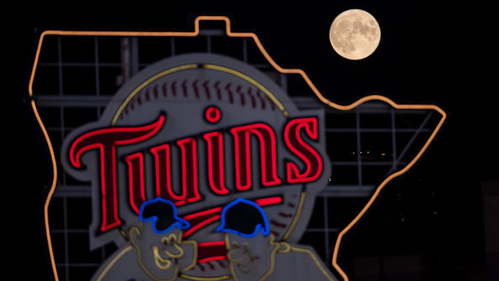 Sep 1, 2020; Minneapolis, Minnesota, USA; A full moon rises over the Minnesota Twins logo in a game between the Minnesota Twins and Chicago White Sox at Target Field. Mandatory Credit: Brad Rempel-Imagn Images