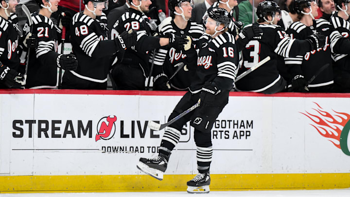 Apr 12, 2026; Newark, New Jersey, USA; New Jersey Devils right wing Connor Brown (16) celebrates with teammates after scoring a goal against the Ottawa Senators during the first period at Prudential Center. Mandatory Credit: John Jones-Imagn Images