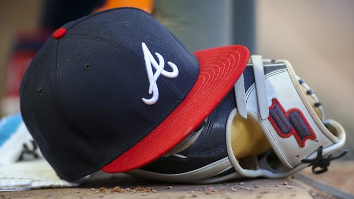 May 31, 2019; Atlanta, GA, USA; Detailed view of hat and glove of Atlanta Braves center fielder Ronald Acuna Jr. (not pictured) against the Detroit Tigers in the fourth inning at SunTrust Park. Mandatory Credit: Brett Davis-Imagn Images
May 31, 2019; Atlanta, GA, USA; Detailed view of hat and glove of Atlanta Braves center fielder Ronald Acuna Jr. (not pictured) against the Detroit Tigers in the fourth inning at SunTrust Park. Mandatory Credit: Brett Davis-Imagn Images