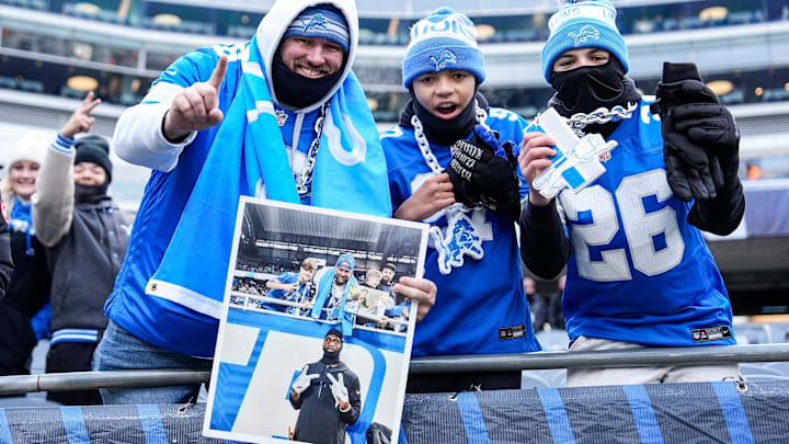 Detroit Lions fans cheer.