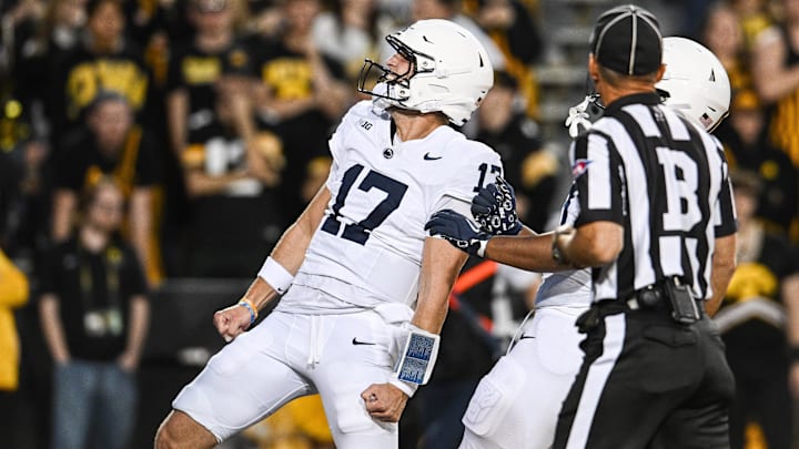 Penn State football quarterback Ethan Grunkemeyer (17) reacts after a touchdown against the Iowa Hawkeyes