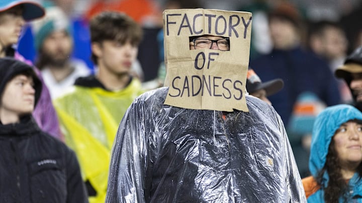Dec 29, 2024; Cleveland, Ohio, USA; A Cleveland Browns fan wears a bag over his head during the fourth quarter against the Miami Dolphins at Huntington Bank Field. Mandatory Credit: Scott Galvin-Imagn Images