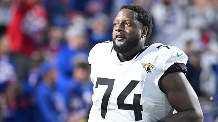 Sep 23, 2024; Orchard Park, New York, USA; Jacksonville Jaguars offensive tackle Cam Robinson (74) enters the field before a game against the Buffalo Bills at Highmark Stadium.