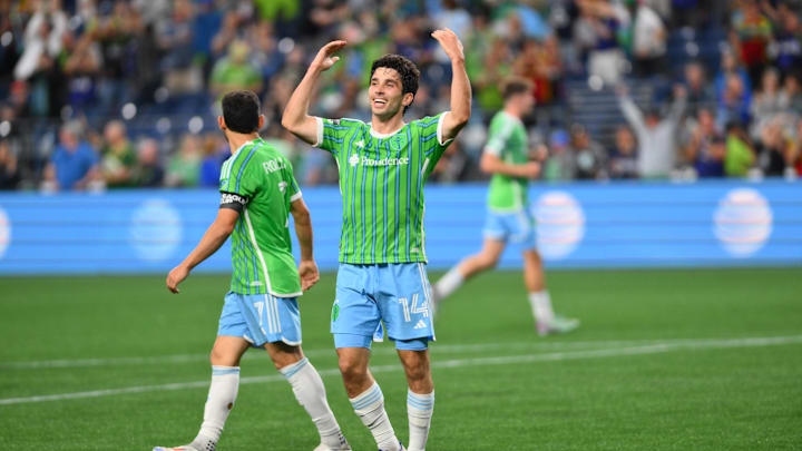 Jul 26, 2024; Seattle, Washington, USA; Seattle Sounders FC forward Paul Rothrock (14) celebrates after scoring a goal against Minnesota United during the second half at Lumen Field. Mandatory Credit: Steven Bisig-USA TODAY Sports