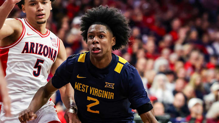 Jan 24, 2026; Tucson, Arizona, USA; West Virginia Mountaineers guard Amir Jenkins (2) dribbles the ball during the first half of the game against the Arizona Wildcats at McKale Memorial Center. Mandatory Credit: Aryanna Frank-Imagn Images
