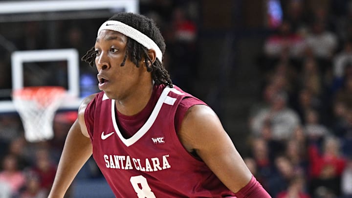 Jan 18, 2025; Spokane, Washington, USA; Santa Clara Broncos forward Elijah Mahi (8) controls the ball against the Gonzaga Bulldogs in the first half at McCarthey Athletic Center.