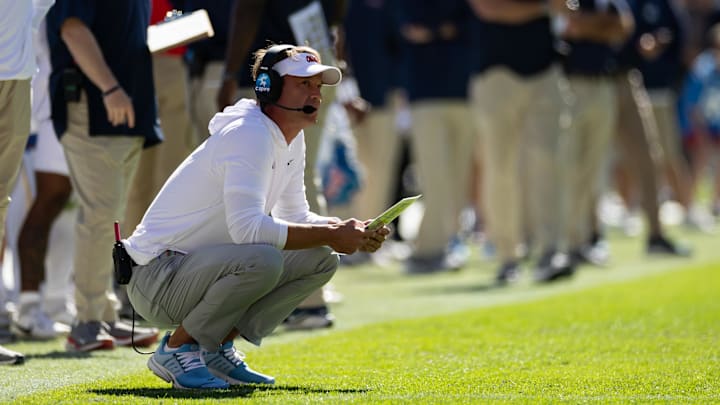 Nov 23, 2024; Gainesville, Florida, USA; Mississippi Rebels head coach Lane Kiffin looks on against the Florida Gators during the first half at Ben Hill Griffin Stadium. Mandatory Credit: Matt Pendleton-Imagn Images