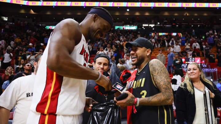 Mar 29, 2024; Miami, Florida, USA; Miami Heat forward Jimmy Butler (22) and Brazilian professional soccer player Neymar Jr. meet after the game against the Portland Trail Blazers at Kaseya Center. Mandatory Credit: Sam Navarro-USA TODAY Sports Mar 29, 2024; Miami, Florida, USA; Miami Heat forward Jimmy Butler (22) and Brazilian professional soccer player Neymar Jr. meet after the game against the Portland Trail Blazers at Kaseya Center. Mandatory Credit: Sam Navarro-USA TODAY Sports