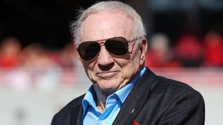 Dallas Cowboys owner and member of the 1964 Arkansas Razorbacks national championship team, Jerry Jones, looks on as the team is honored during the first half against the Texas Longhorns at Donald W. Reynolds Razorback Stadium. 