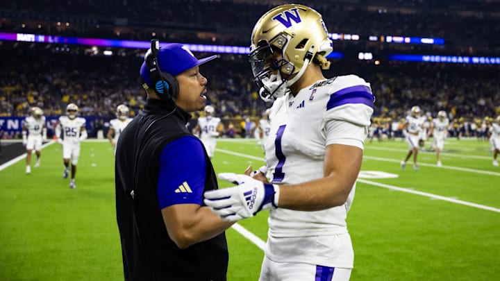 UW cornerbacks coach Julius Brown and receiver Rome Odunze share a moment before the 2024 CFP national championship game.