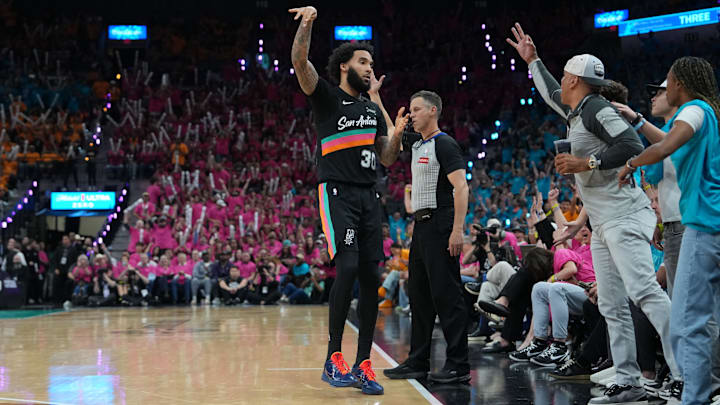 May 4, 2026; San Antonio, Texas, USA; San Antonio Spurs forward Julian Champagnie (30) reacts in the second half against the Minnesota Timberwolves during game one of the second round of the 2026 NBA Playoffs at Frost Bank Center. Mandatory Credit: Daniel Dunn-Imagn Images