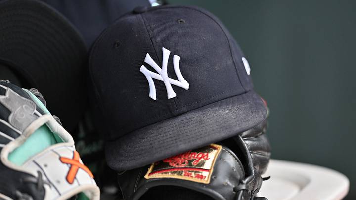Aug 2, 2026; Chicago, Illinois, USA; A detail view of a New York Yankees baseball hat and a glove during the eighth inning against the Chicago Cubs at Wrigley Field. Mandatory Credit: Patrick Gorski-Imagn Images Aug 2, 2026; Chicago, Illinois, USA; A detail view of a New York Yankees baseball hat and a glove during the eighth inning against the Chicago Cubs at Wrigley Field. Mandatory Credit: Patrick Gorski-Imagn Images