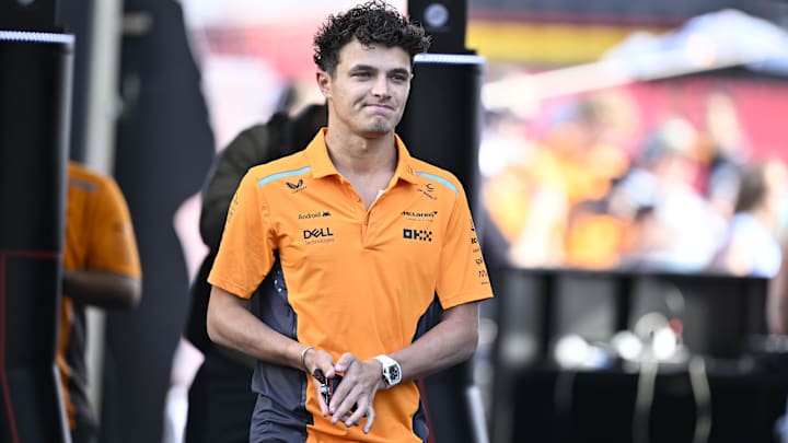 Oct 19, 2024; Austin, Texas, USA; McLaren Formula 1 Team driver Lando Norris (4) of Team Great Britain walks into the track before the Sprint Race in the 2024 Formula One US Grand Prix at Circuit of the Americas. Mandatory Credit: Jerome Miron-Imagn Images