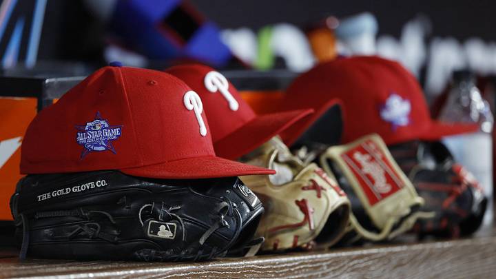 May 2, 2026; Miami, Florida, USA; Philadelphia Phillies starting hats and gloves sit on the bench against the Miami Marlins during the fifth inning at loanDepot Park. May 2, 2026; Miami, Florida, USA; Philadelphia Phillies starting hats and gloves sit on the bench against the Miami Marlins during the fifth inning at loanDepot Park.