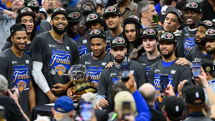 May 25, 2026; Cleveland, Ohio, USA; New York Knicks pose with the 2026 Eastern Conference trophy after defeating the Cleveland Cavaliers in game four of the eastern conference finals for the 2026 NBA playoffs at Rocket Arena. Mandatory Credit: David Richard-Imagn Images