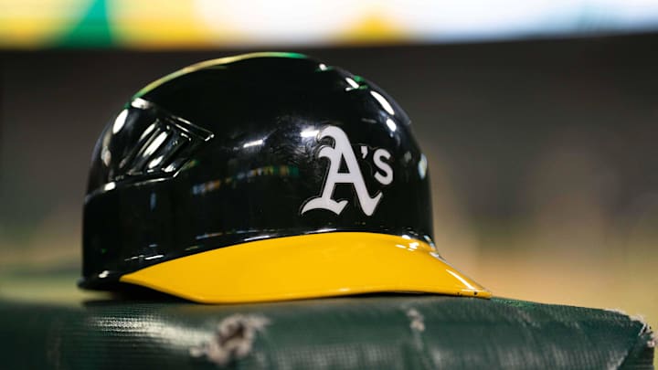 Jul 23, 2024; Oakland, California, USA;  General view of an Oakland Athletics helmet after defeating the Houston Astros at Oakland-Alameda County Coliseum. Mandatory Credit: Stan Szeto-Imagn Images