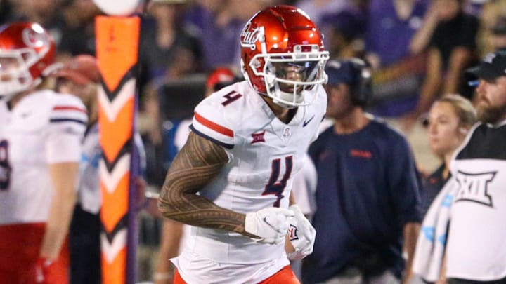 Sep 13, 2024; Manhattan, Kansas, USA; Arizona Wildcats wide receiver Tetairoa McMillan (4) runs a pass route during the fourth quarter against the Kansas State Wildcats at Bill Snyder Family Football Stadium.