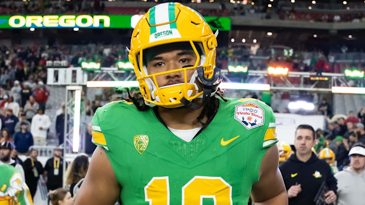 Jan 1, 2024; Glendale, AZ, USA; Oregon Ducks defensive end Matayo Uiagalelei (10) against the Liberty Flames during the 2024 Fiesta Bowl at State Farm Stadium. Mandatory Credit: Mark J. Rebilas-Imagn Images Jan 1, 2024; Glendale, AZ, USA; Oregon Ducks defensive end Matayo Uiagalelei (10) against the Liberty Flames during the 2024 Fiesta Bowl at State Farm Stadium. Mandatory Credit: Mark J. Rebilas-Imagn Images