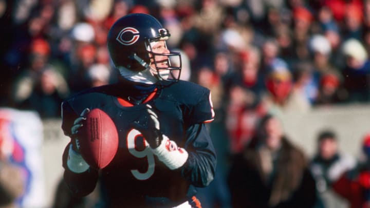 Jan 1988; Chicago, IL, USA; FILE PHOTO; Chicago Bears quarterback #9 Jim McMahon in action against the Washington Redskins at Soldier Field during the 1987 NFC Divisional Playoff Game. The Redskins defeated the Bears 21-17. Mandatory Credit: Photo By Malcolm Emmons-USA TODAY Sports © Copyright Malcolm Emmons